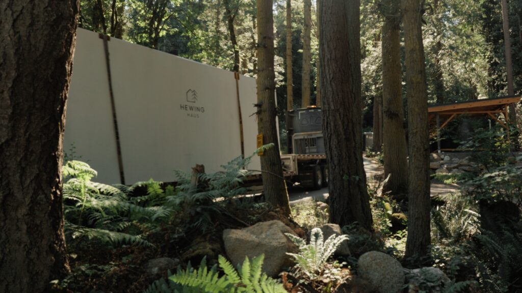 Hewing Haus driving through the woods